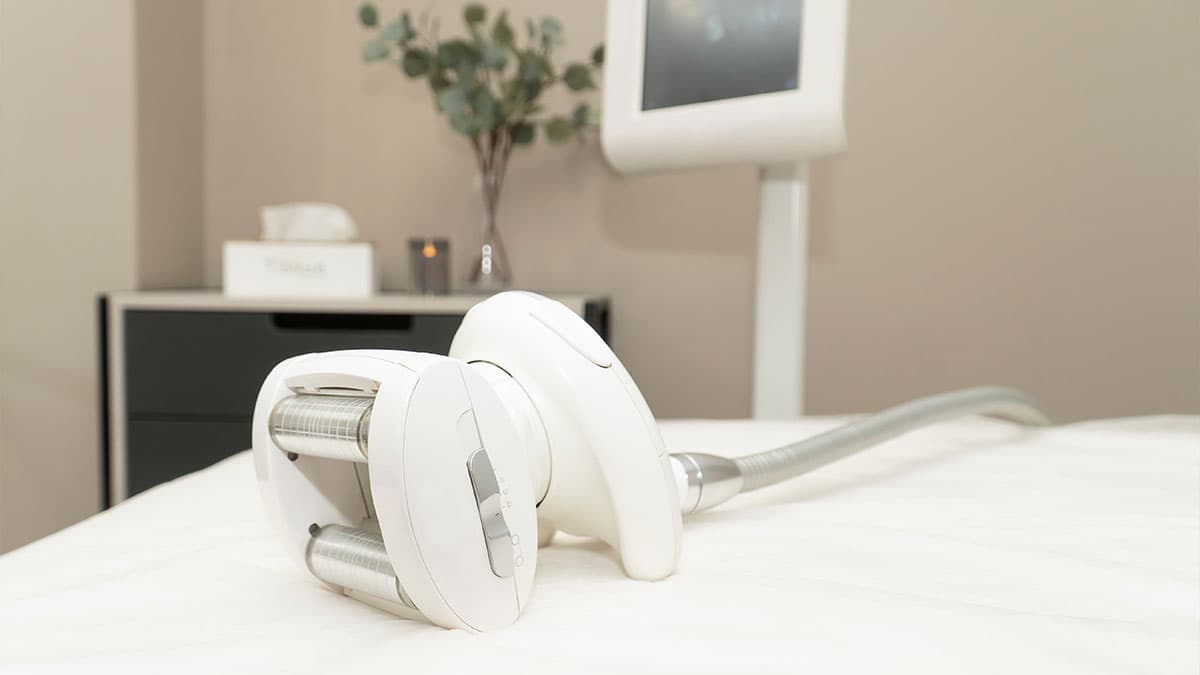 LPG Endermologie treatment head resting on a treatment table