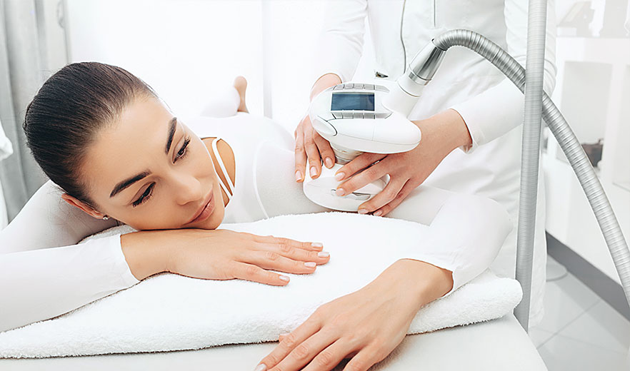 Woman receiving Endermologie treatment at European Rejuvenation Center, a non-invasive therapy for cellulite reduction.